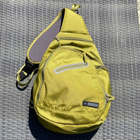 REI Handbags - REI Lime Green Sling Backpack - NWOT